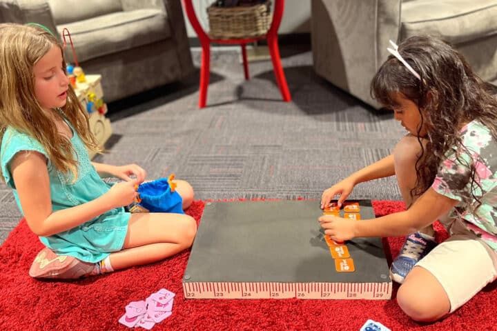 Children Setting Up Pick Up Locks Two children setting up a game of Pick Up Locks.