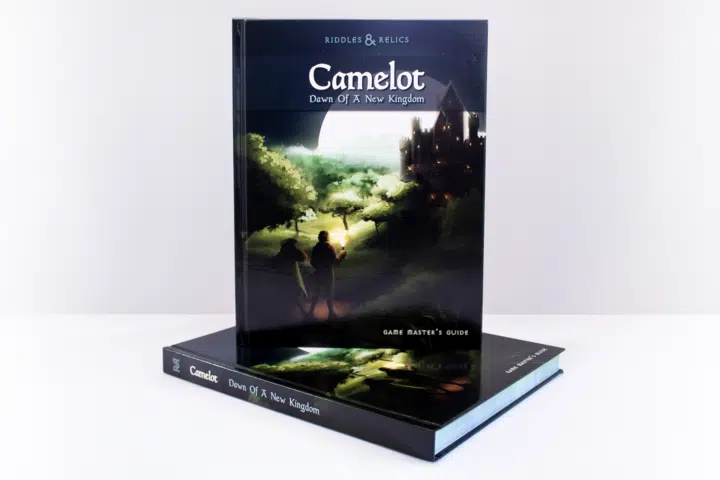 Camelot: Dawn Of A New Kingdom The cover of a roleplaying adventure book, which shows two characters heading towards a castle.