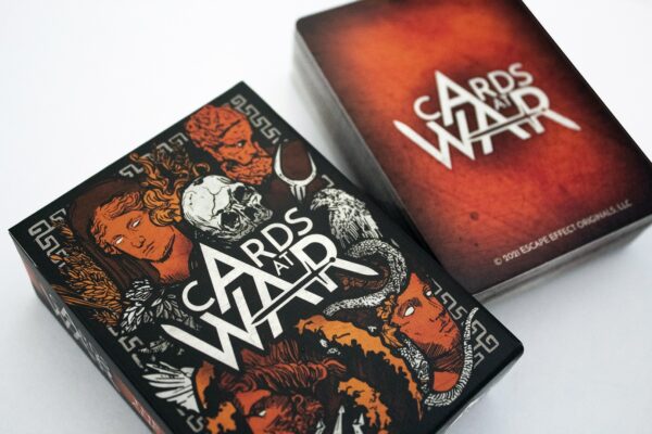 A deck of Cards At War and the card box sit side-by-side.