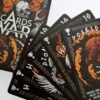 Five god cards from Cards At War fanned out, with Poseidon on top. Another card, with its reverse side up, is next to them.