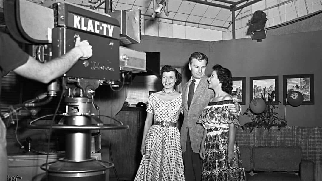 Betty White and others on a tv set.