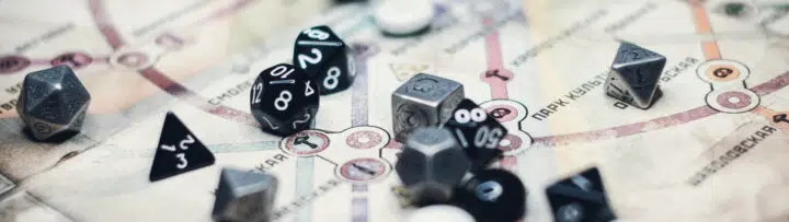 A set of dice on a board game map.