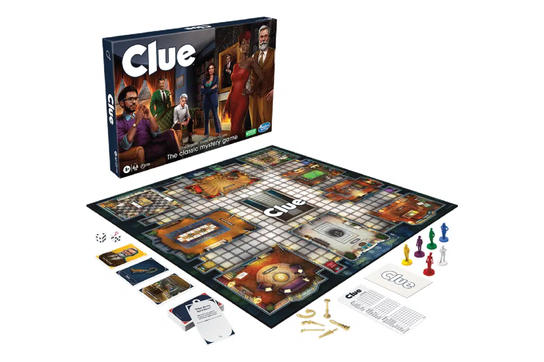 The box and contents of Clue laid out.