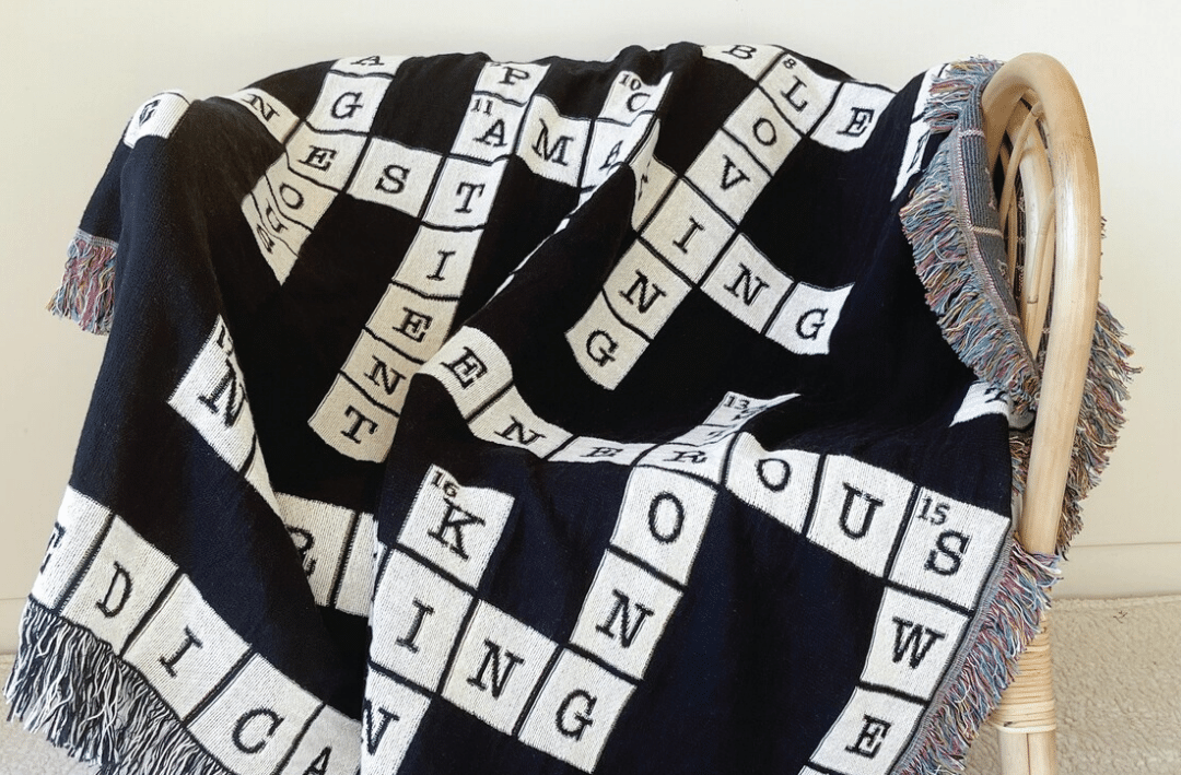 Crossword blanket made by Cozyloftdesigns on Etsy.