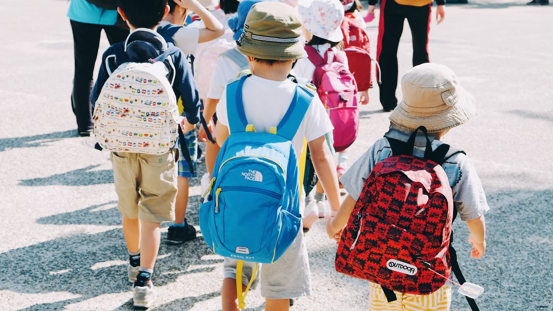 A photo of students walking together.