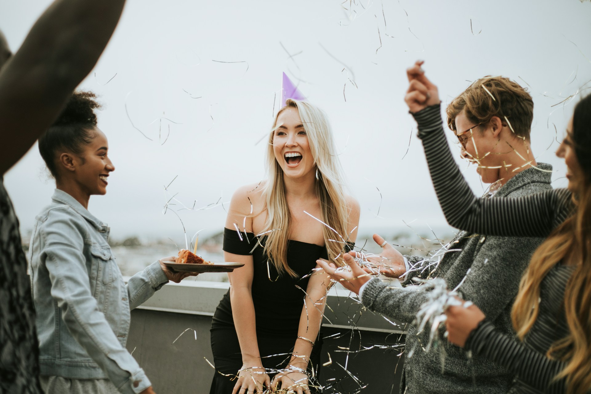 A group of teenagers celebrate.