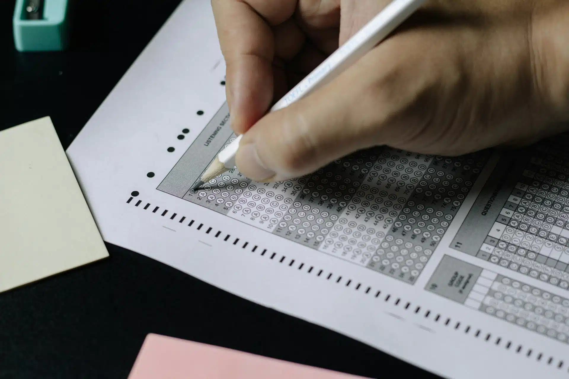 A close up view of someone taking a test.