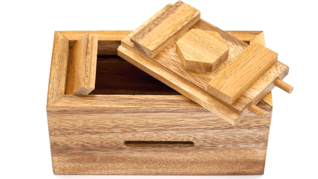 A wooden puzzle box that has been solved.