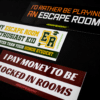 A trio of bumper stickers with escape room themed phrases.
