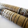 Two tubes containing escape room-themed scratch off posters.