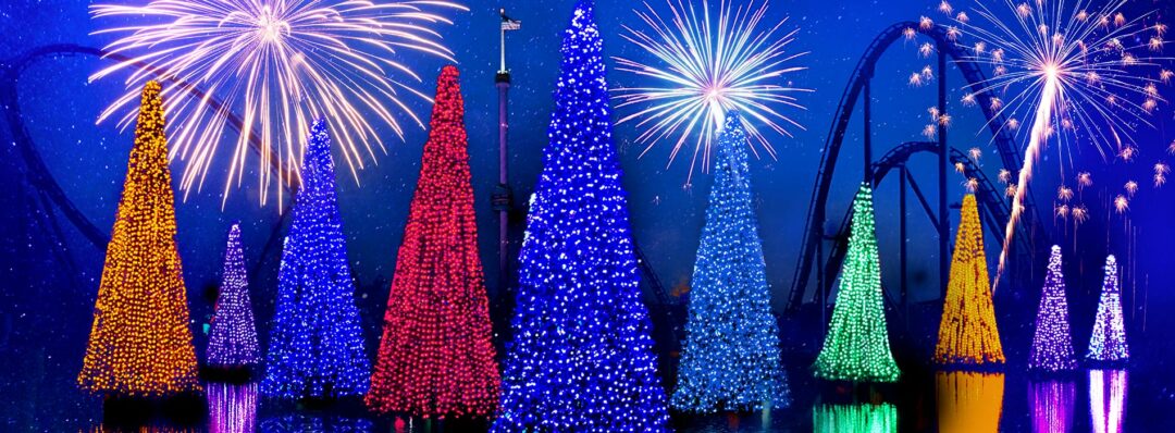 70-foot Xmas trees lit in different colors float on SeaWorld's lake.
