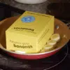 A photo of a Fanatics Gone Bananas box being pan fried along with some banana slices.