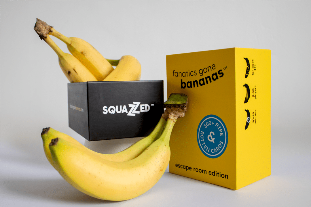 A photograph of the Fanatics Gone Bananas box, with a side of real bananas.