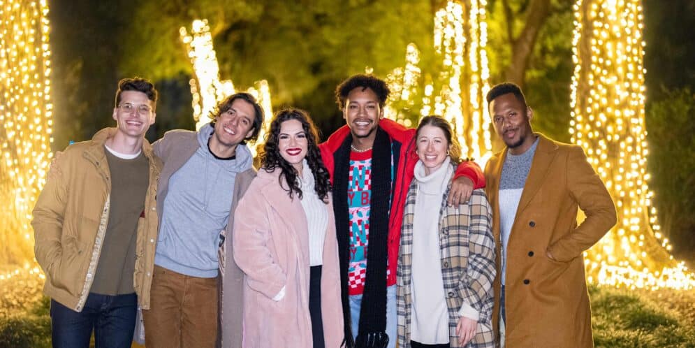 Photo of a group of people enjoying the Leu Gardens Holiday Lights.