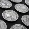 A photograph of the Fright Before Your Eyes Challenge Coins.
