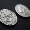 A photograph of the Fright Before Your Eyes Challenge Coin.