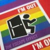 An arrangement of rainbow magnets with a man exiting a door and the phrase 'I'M OUT'.