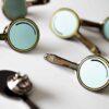 Grouping of Sherlock Studies Magnifying Glass pins.