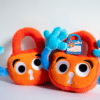 Two Paddy the padlock plushie side by side.