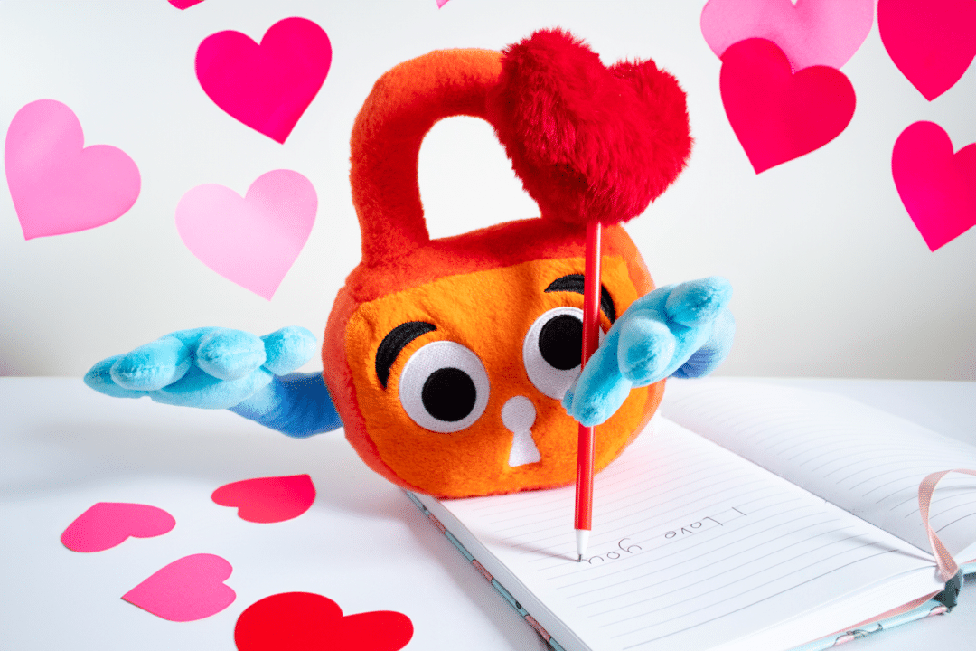 Paddy Padlocks uses a fluffy heart pen to write a love letter.