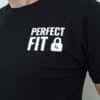 A photo showing a shirt with the phrase Perfect Fit, with an image of a padlock.