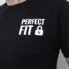 A photo showing a shirt with the phrase Perfect Fit, with an image of a padlock.