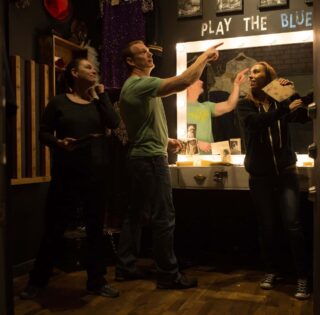Players searching the dressing room in Encore.