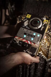 The SD2000 with four lights on, showing how many spirits have been found.