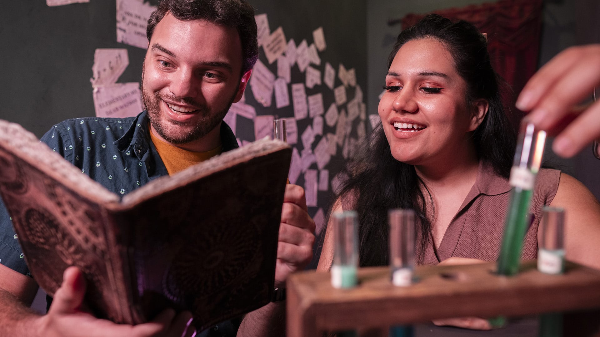 Two players investigate test tubes and a journal, and work together to solve the puzzle.