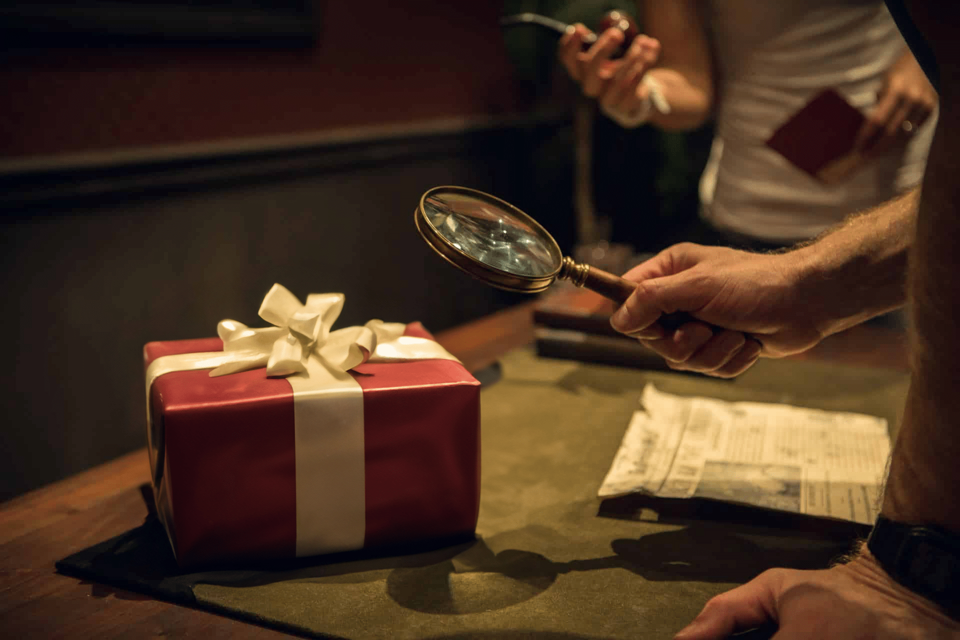 A present appears on the desk in Sherlock Studies.